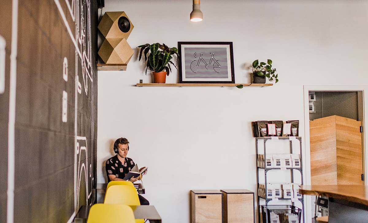 human man sitting on chair person